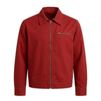 Front view of the Leveljacket Crimson Red cotton utility jacket showcasing a pointed turn-down collar, metallic front zipper, a horizontal zippered left chest pocket, and a clean minimalist back panel design.