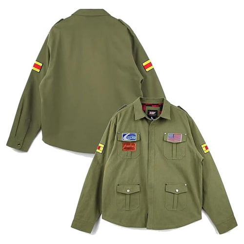 A promotional graphic for the Leveljacket Silent Hill 2 James Jacket showcasing a model wearing the green cotton field coat on the left, a back view panel on the upper right, and close-up panels of the game-accurate embroidered American flag, text patches, and yellow-red sleeve stripes on the lower right.