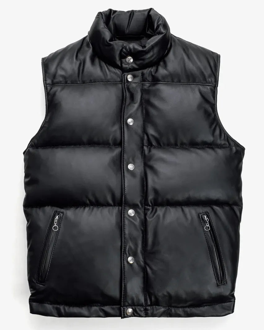 Front showcase of the Leveljacket Matte Black leather quilted puffer vest, detailing its wide horizontal thermal baffles, high insulated stand-up collar, front vertical zipper pockets, snap-button closure placket, and elasticated lower back hem.
