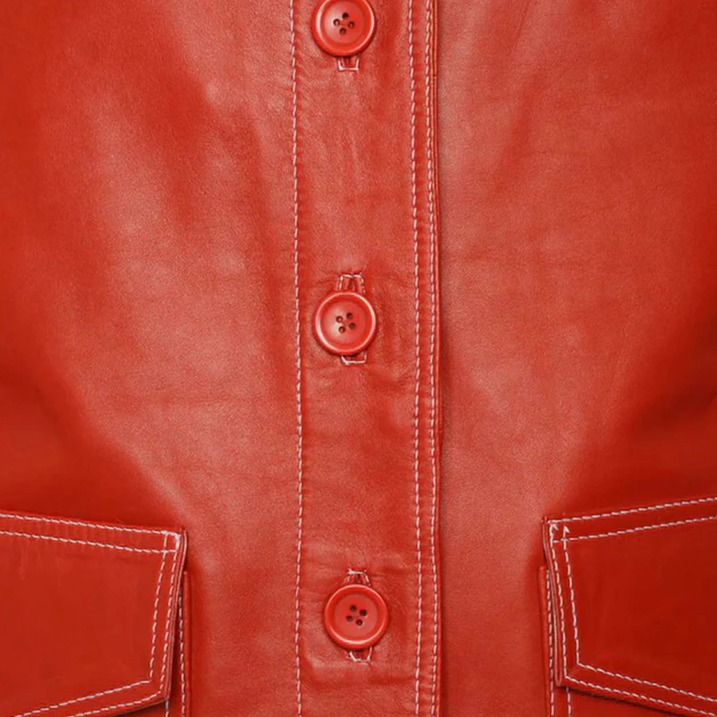 Zoom Front views of the Leveljacket Tyler Durden Fight Club red leather jacket, showcasing its prominent 1970s wide lapels, 4-button front closure, large flap waist pockets, and detailed white contrast seam stitching.