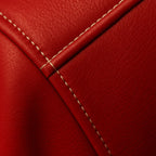 Zoom views of the Leveljacket Tyler Durden Fight Club red leather jacket, showcasing its prominent 1970s wide lapels, 4-button front closure, large flap waist pockets, and detailed white contrast seam stitching."